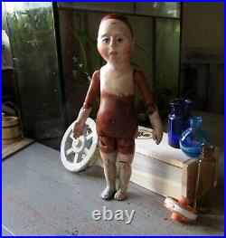 European wooden doll. Bobblehead. Replica
