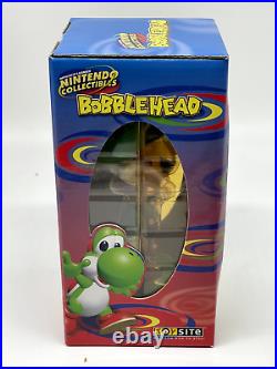 RARE Nintendo Vintage Collectible! Set of four! Bobble heads! 2002