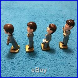 Set of 4 vintage Beatles small bobble-head figures from 1960s