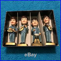 Set of 4 vintage Beatles small bobble-head figures from 1960s