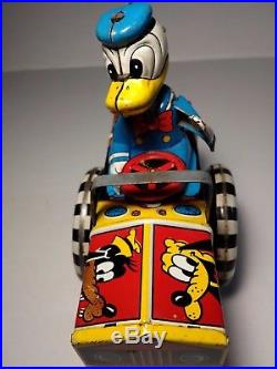 Vintage 1950's Line Mar Donald Duck Dipsy Car Tin Windup with Bobble head Tin Head