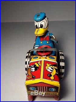 Vintage 1950's Line Mar Donald Duck Dipsy Car Tin Windup with Bobble head Tin Head