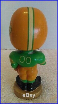 Vintage 1960's Green Bay Packers NFL Toes Up Bobblehead Nodder Round Gold Base