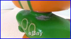 Vintage 1960's Green Bay Packers NFL Toes Up Bobblehead Nodder Round Gold Base