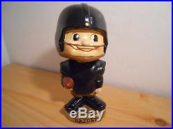 Vintage 1961 Oakland Raiders Baggy Shirt Bobblehead doll Mint