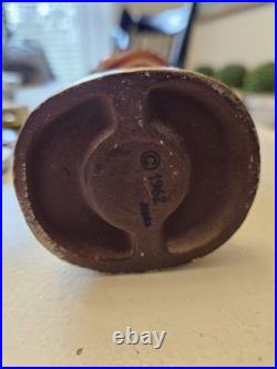 Vintage 1962 Dallas Cowboys bobblehead with gold base, toes up. RARE