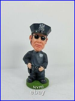 Vintage NYPD Bobble Head Looks Like Nicolas Cage