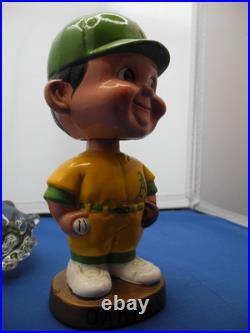 Vintage Oakland A's Bobble head gold base VERY GOOD condition(1967)