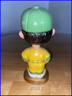 Vintage Oakland A's Bobble head gold base great condition