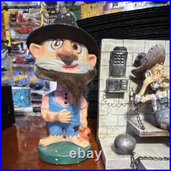 Vintage decor hillbilly jail cell and west Virginia hillbilly bobble head