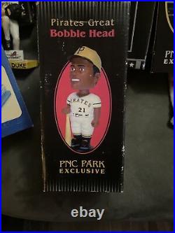 Vintage lot of pittsburgh pirates bobblehead and figurines